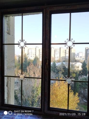 telefon ucun ekran şəkilləri: Plastik pəncərələrin və icərisində şəbəkələrin yıgılması hər rəngi var — 1