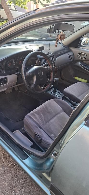 bmw g30 stop: Nissan Sani - Kuzov: sedan, yaşıl-boz rəng - Mühərrik: benzin - — 3