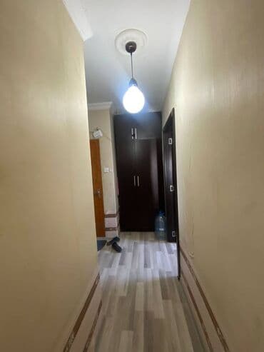 ucuz bina evləri: Yasamal rayonu (77 dayanacağın sonu) yeni tikili 22 mertebeli binanın — 13