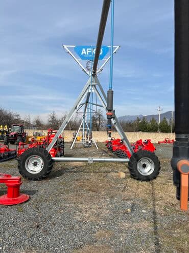 taxıl biçən kombaynlar: Pivot suvarma sistemləri. Çox keyfiyyətli Afko firmasıdır. Hektara — 3