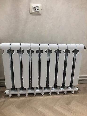 radiatır: 4 ədəd 12 kiloluq radiatorlar. təzə paketin icindedirler. şəkildəki — 2