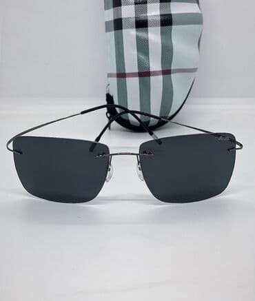 qadın eynəkləri ucun futlyar: Qara rəngli çərçivəsiz dizayna malik unisex günəş eynəyi. Düzbucaqlı — 2