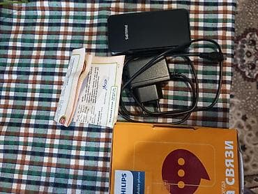 mobil telfonlar: Philips Xenium qapaqlı mobil telefon 10.15 gundu alnib tezdi demek — 1