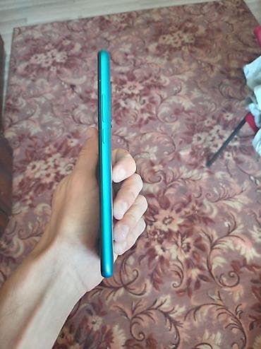 tv box android: Məhsul: Redmi smartfon (Model arxa örtükdə “Redmi” yazısı ilə — 5