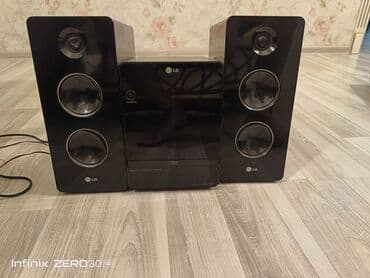 цена плейстейшен 3: İki dinamik və mərkəzi blokdan ibarət LG mini Hi-Fi sistemi. Real — 1
