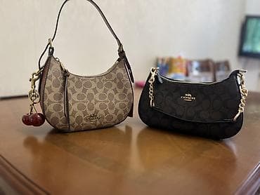 Coach cantalar her ikisi yeni kimidir elave uzunqulplarida var