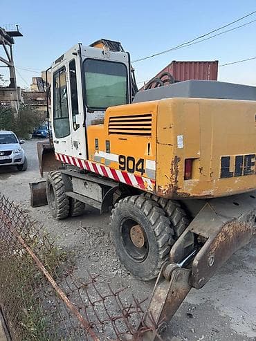 disk teker type 1 per page 40: Liebherr 904 təkərli ekskavator.İl 2000, işləmə saatı 27000, çox əla — 2