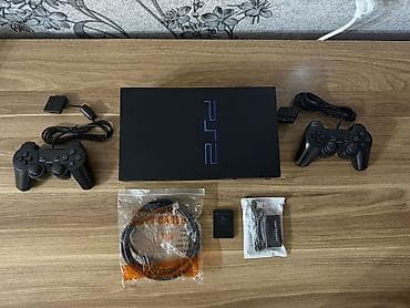 Playstation 2 Fat İdeal Vəziyətdə Hal hazırda disk yeri işləyən FAt