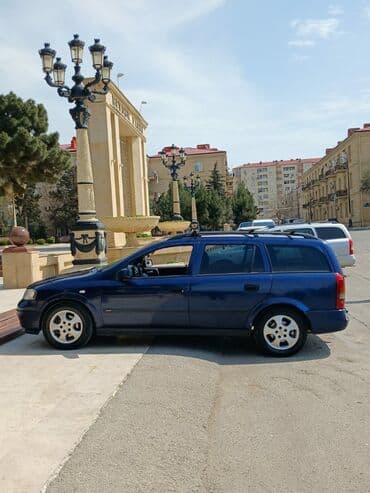 nissan oluxana baksol: Opel Astra: 2 l | 1999 il 600000 km Universal — 6