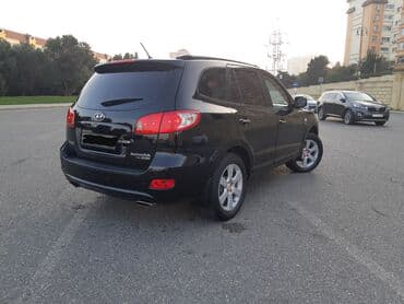 фольксваген 2: Hyundai Santa Fe: 2.7 л | 2006 г. Внедорожник — 4