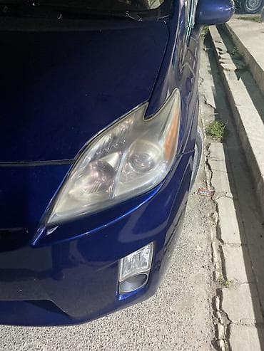 opel 1 3: Toyota Prius – hibrid hetçbek Xüsusiyyətlər: - Kuzov: hetçbek, mavi — 2