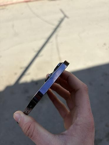 en ucuz apple macbook pro: IPhone 14 Pro Max, 128 GB, Deep Purple — 5