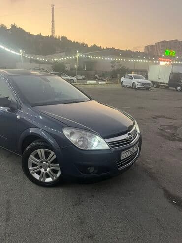 kia sportage 2006: Opel Astra H – 5 qapılı hetçbek Xüsusiyyətlər: - Kuzov — 3