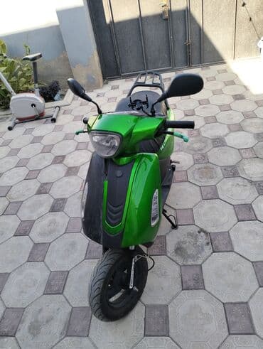 disk teker per page 40: Sarı rəngli şəhər skuterinə elan arxa baqajı da verilir üstün de - — 2