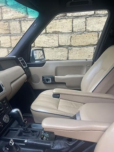 skorus basliqi: Range Rover (L322) – ağ rəngli, tam ölçülü premium SUV. Texniki və — 4