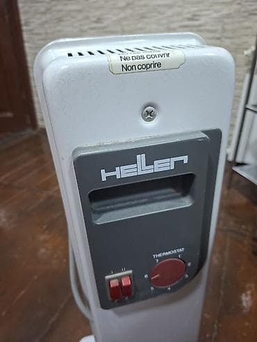 radiator alıram: Ağ rəngli, təkərli, daşınması asan yağlı radiator. Bu radiator rahat — 3