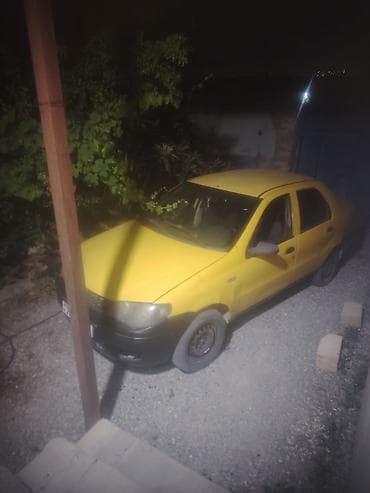 tesla disk: Fiat Albea sedan - Rəng: sarı (qara bamperlərlə) - Kuzov: 4 qapılı — 3