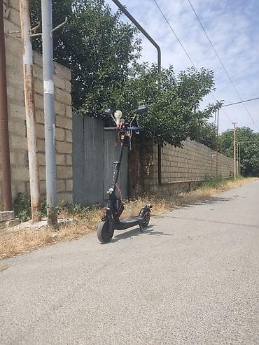 elektrik samokat: Elektrik skuter – şəhər içi sürüş üçün təkmilləşdirilmiş model — 4