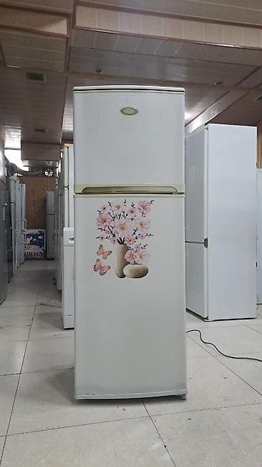 dondurucu: Bu ikiqapılı soyuducu ağ rəngdədir və üst hissəsində dondurucu bölməsi — 1