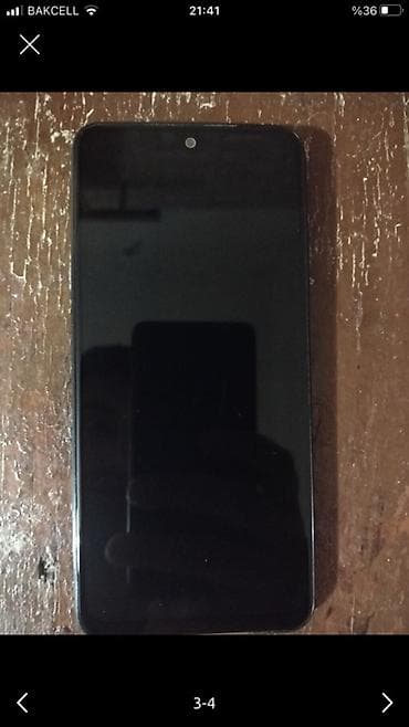 Xiaomi Redmi smartfon - Model: Redmi (arxa qapaqda “Redmi” loqosu) - — 2