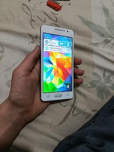 Samsung Galaxy Grand 2, 8 ГБ, цвет - Белый, Две SIM карты — 4