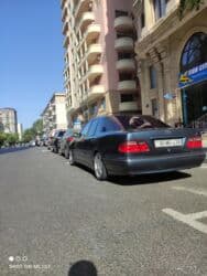 kia ceed 2010: Mercedes-Benz E 200: 2 l | 2000 il Sedan — 18