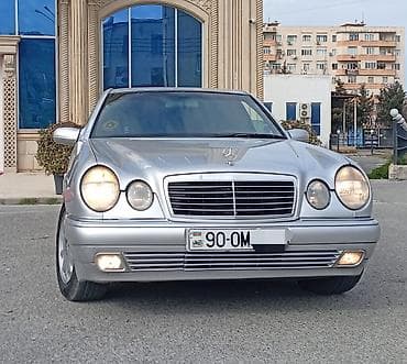 2000 bmw 320i: Mercedes-Benz E-Class: 2.4 l | 1999 il Sedan — 3