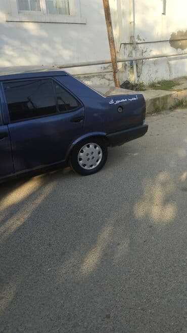 taksi maşınları: Model: Tofas Şahin/Doğan sedan (mavi rəng) Kuzov: 4 qapılı, klassik — 3