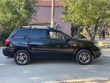 mitsubişi l 200: Mitsubishi Outlander, qara rəng, 5 qapılı krossover/SUV — 10
