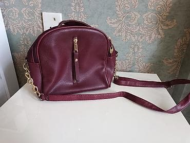 aksesuarlar: Çanta çox genişdir 2 hissəsidir arxada da balaca cibi var. Çox az — 1