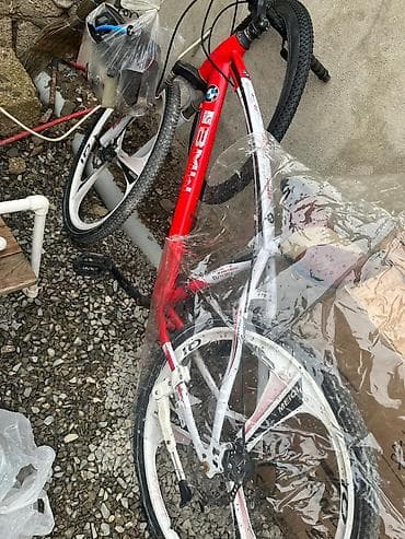 bicycle: Velosiped – dağ/şosse tərzi, 26" təkər ölçüsü Xüsusiyyətlər: - — 1