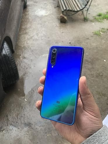 samsung a3 2018: Xiaomi Mi 9 SE, 128 GB, rəng - Mavi, 
 İki sim kartlı — 3