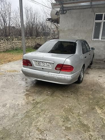 volkswagen tiguan ii: Mercedes-Benz E-Class: 2.2 л | 1997 г. Седан — 4