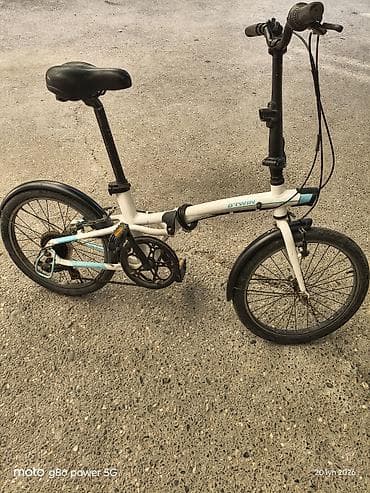volta: BTWIN firma alüminium qatlanan velosiped. Portuqaliya istehsalıdır. 20 — 2