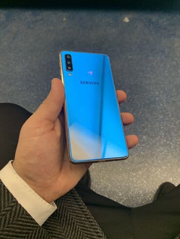 Samsung Galaxy A7 2018, 128 GB, rəng - Mavi, İki sim kartlı, Barmaq izi, Face ID lalafo.az -da Samsung Galaxy A7 2018, 128 GB, rəng - Mavi, İki sim kartlı, Barmaq izi, Face ID