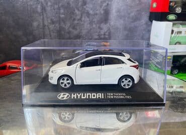 maşın modeli: Коллекционная модель Hyundai i30 5 door white 2012 Pino B&D Scale — 6