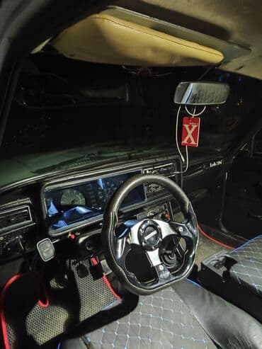 MOMO idman sükanı 07 pastafkası ilə - Üçşüalı dizayn, mərkəzdə MOMO