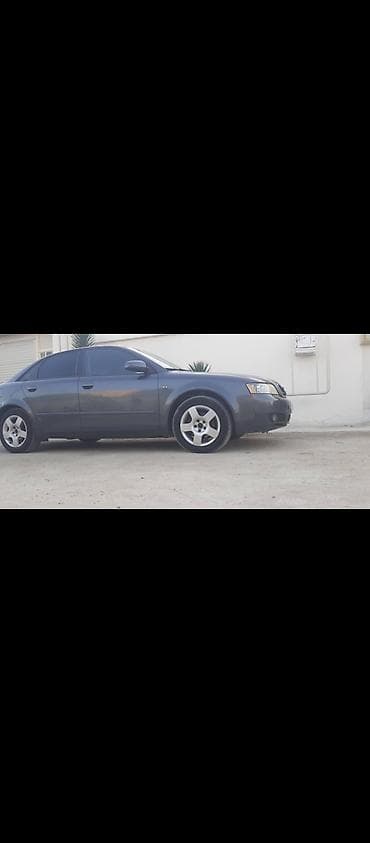 bmw e39 2003: Audi A4 sedan – tünd boz rəng, 4 qapı, 5 yerlik. B6 kuzov dizaynı — 7