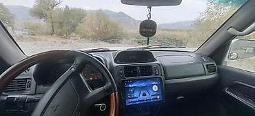 lider diskleri: Mitsubishi Pajero ıo 2002 1.8 (5 qapı) – gümüş rəngdə kompakt — 6