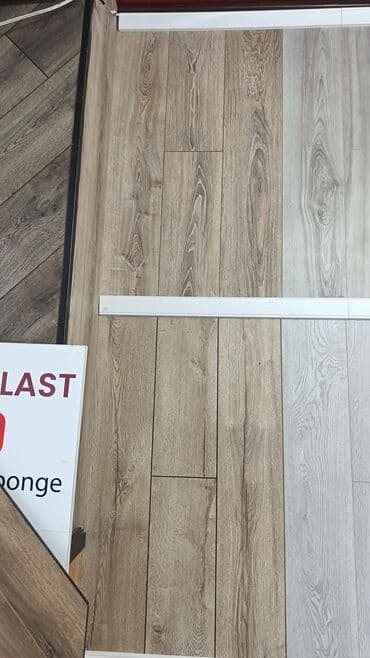 Ламинат: Məhsul: Laminat döşəmə örtükləri və aksesuarları Təsvir: - Mağazada — 6