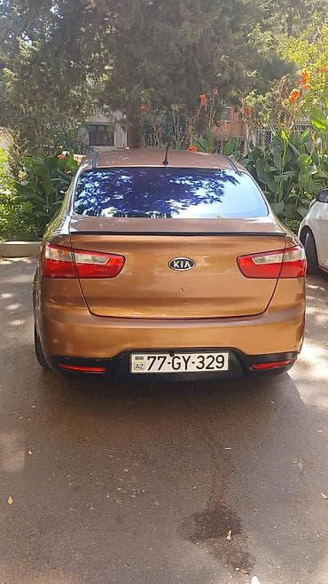 prius 30 kuza: Kia Rio: 1.2 l | 2012 il Sedan — 2