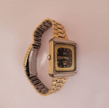 el fecr saat: İşlənmiş, Qol saatı, Orient, rəng - Qızılı — 5