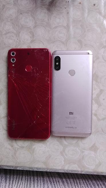 запчасти на телефон fly: İki ədəd smartfon satılır – ehtiyat hissələri üçün: 1) Honor (qırmızı — 2
