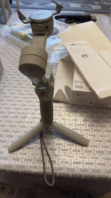 dji osmo 4: DJI OM 4 SE – smartfon stabilizatoru - 3 oxlu mexaniki stabilizasiya — 5