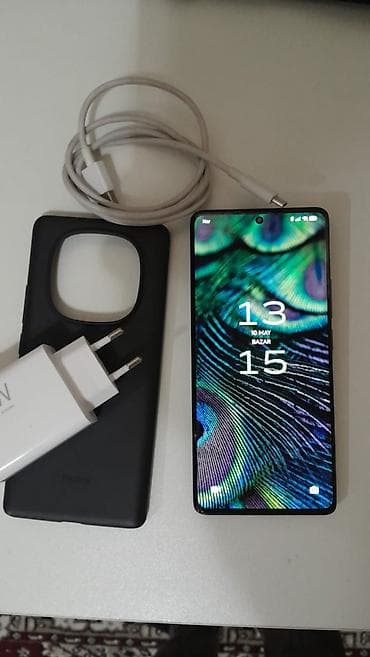 telefin: Redmi 14 pro 256 telefonda cızıq belə yoxdu adapdiri orginal — 1