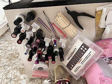 Manikür və gel lak üçün tam set Komplektin tərkibi: - Elektrik frez — 2