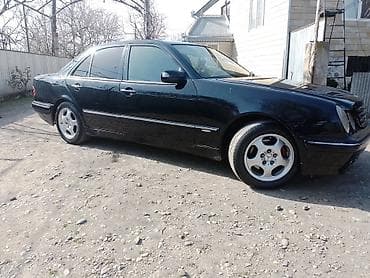 maşin niva: Mercedes-Benz E‑Class (W210) sedan, qara rəng. Xüsusiyyətlər: - — 4