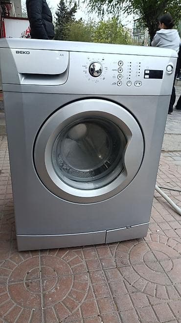 Beko önyükləməli paltaryuyan maşın - Rəng: gümüşü - Enerji sinfi: AA