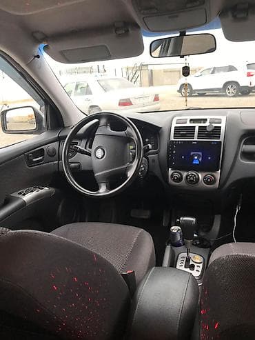masin satmaq: Kia Sportage: 2 l | 2006 il Ofrouder/SUV — 1