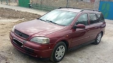 uaz diski: Opel Astra Caravan (Universal) – bordo rəng, geniş və praktik ailə — 3
